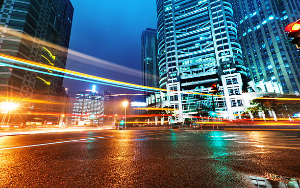 istock light trails on the modern building background in shanghai china 480458335