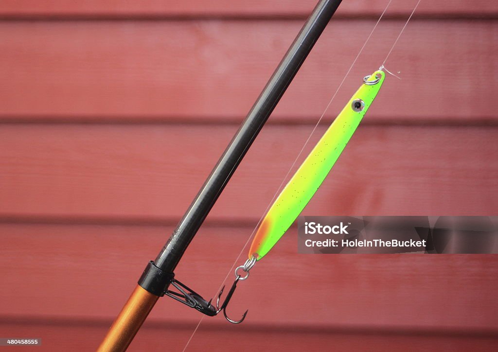 Green Neon Fish Hook On A Fishing Rod Stock Photo - Download Image
