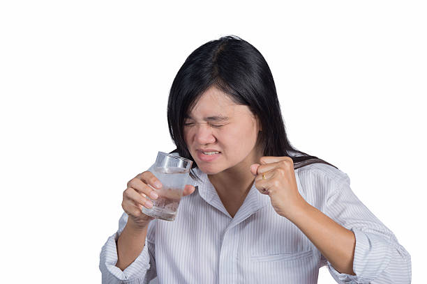 istock Women hyper-sensitive teeth.Isolated on the white blackground. 480460664