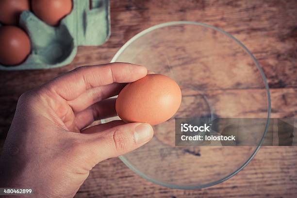 Hand Cracking Egg Stock Photo - Download Image Now - Adult, Adults Only, Animal Egg