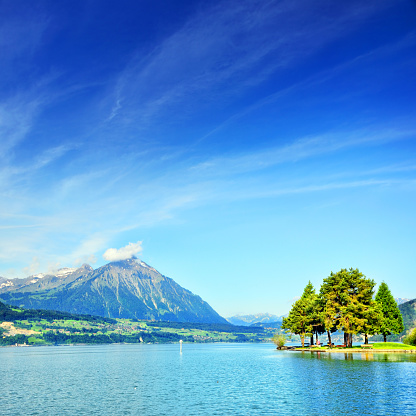 Lake Thun (Thunersee) is an Alpine lake in Switzerland. Composite photo