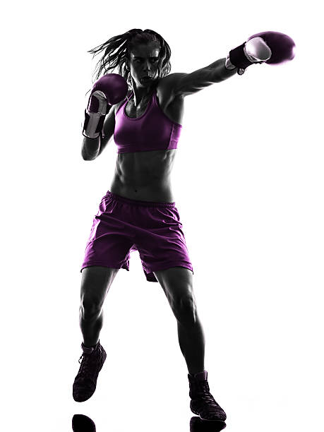 istock woman boxer boxing kickboxing silhouette isolated 480466096