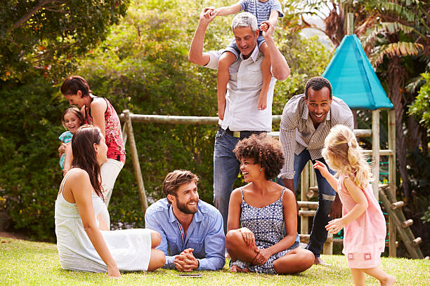 istock Adults and kids having fun in a garden 480473604