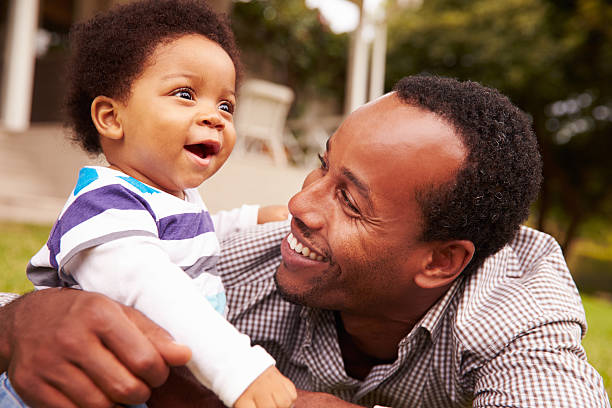 istock Father bonding with his toddler son in a garden 480473684