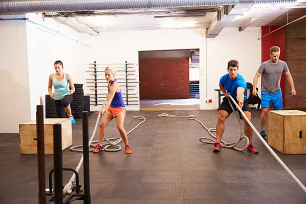 Group Of People In Gym Circuit Training