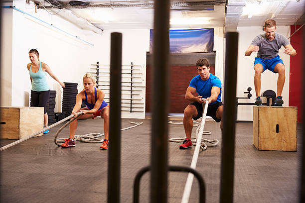 istock Group Of People In Gym Circuit Training 480474188