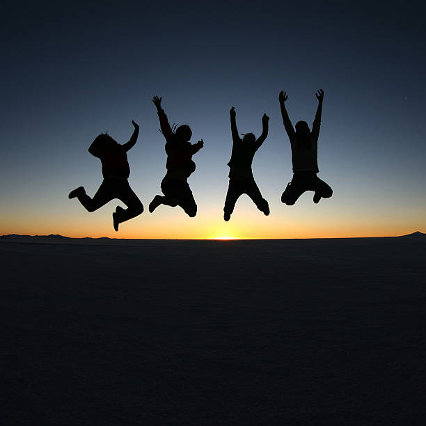 istock Happy friends jumping outdoor 480477137