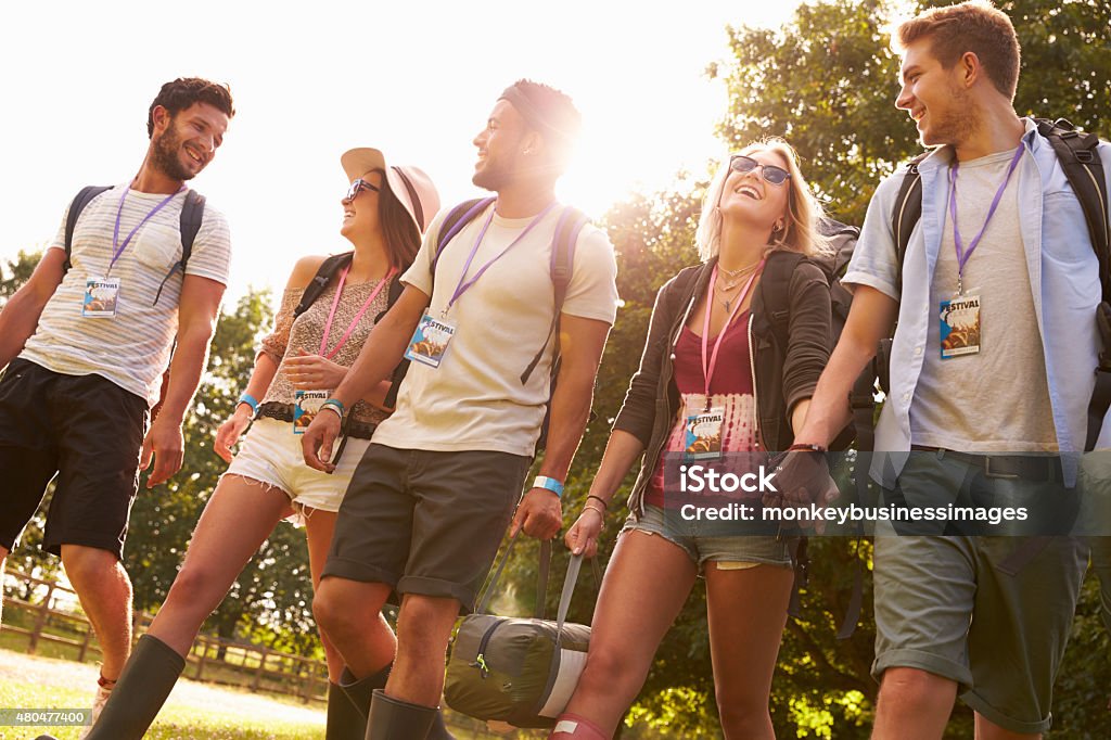 Group Of Young People Going Camping At Music Festival 20-29 Years Stock Photo