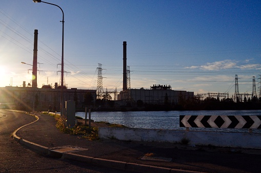View to a small power plant at the end of 38th Avenue in Long Island City which is a part of Queens and is a mixture of new and old, small industries and residential areas close to Manhattan, New York