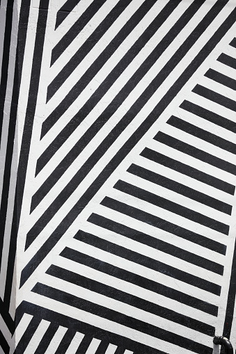 Building painted in black and white stripes