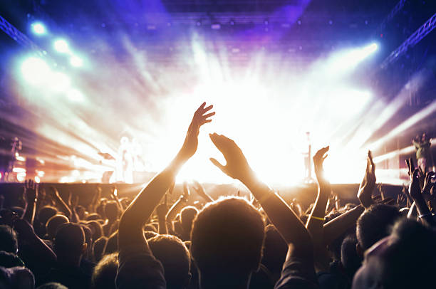istock People at concert party. 480486772