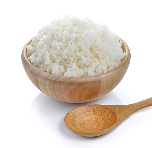 istock rice in wood bowl on white background 480488010