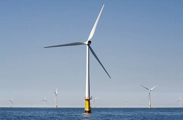 istock Off shore wind farm with scattered turbines 480488884