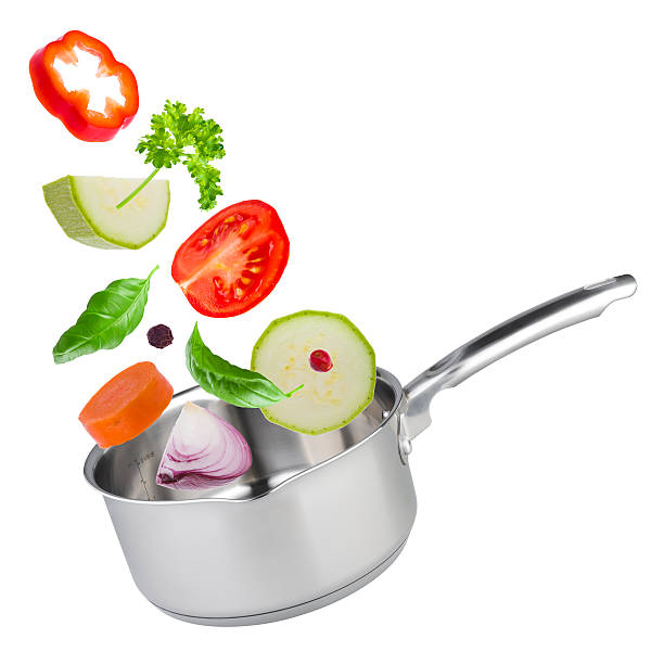 istock Stew pot with tossed up vegetables isolated on white 480491234