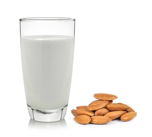 istock almonds and milk on a white wooden background 480491274