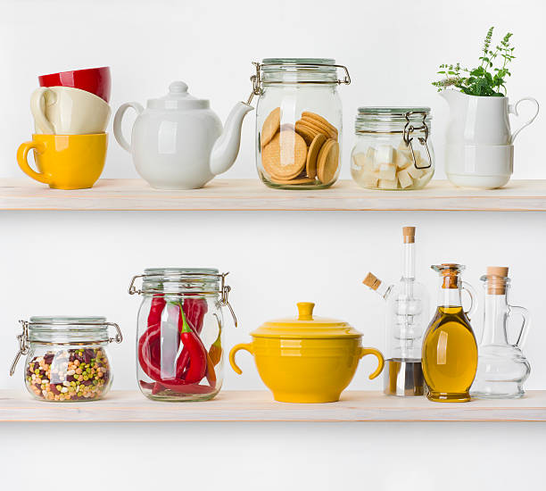 istock Various food ingredients and utensils on kitchen shelves isolated 480491304