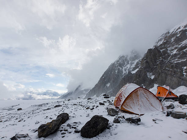 istock Orange tents in mountains 480491867
