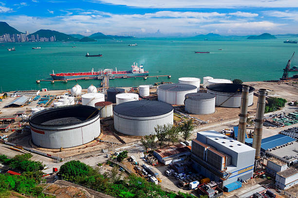 istock Oil Storage tanks with urban background 480493361