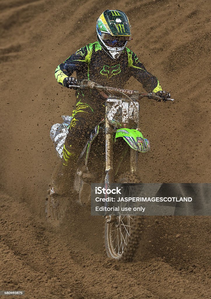 Motocross racer, Round 1,  SMXF at Tain MX, Scotland. Tain, Ross and Cromarty, Scotland, United Kingdom - March 9, 2014: This is a Motocross party within a race at Round 1 of the SMFX at the Tain Motocross Track, Scotland, United Kingdom. This event is open to public viewing. Bicycle Stock Photo