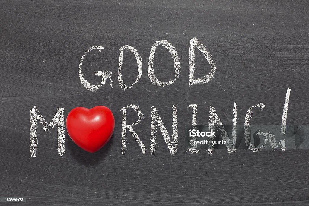 good morning good morning exclamation phrase handwritten on school blackboard Aspirations Stock Photo