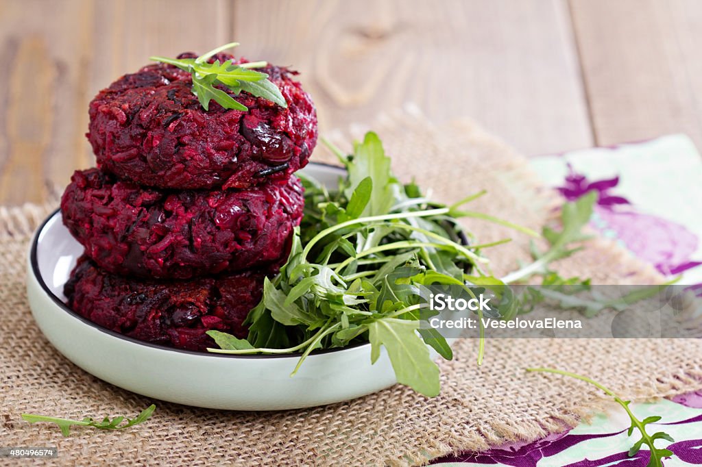 Beetroot vegan burgers with rice and beans Beetroot vegan burgers with rice and red beans Beet Stock Photo