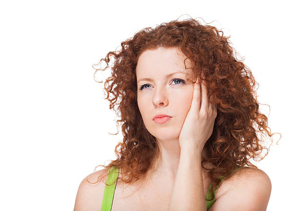 istock Beautiful young woman thinking 480497551