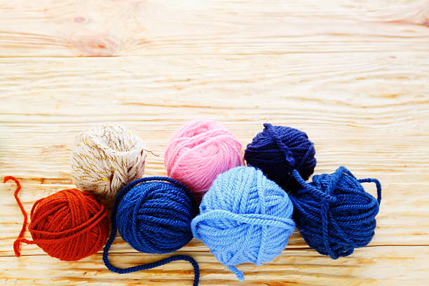 istock balls of colored yarn on the boards 480497625