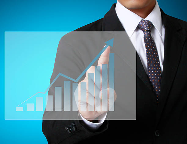 istock financial symbols coming from hand 480497905