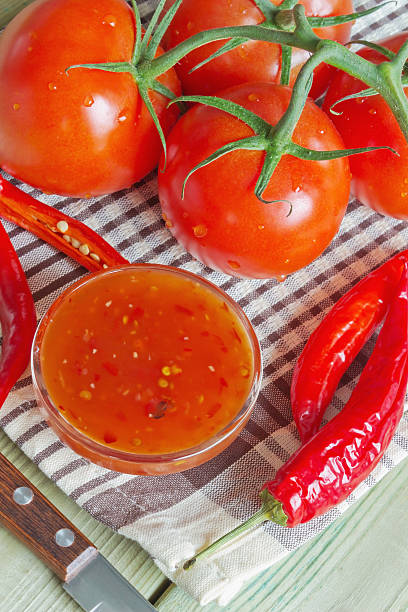 istock tomatoes, hot peppers and sauce 480498209