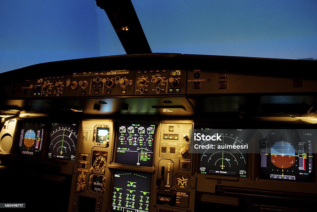 plane control Light from a plane control  room in the dark. Aerospace Industry Stock Photo