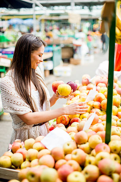 istock Young woman on the market 480499454