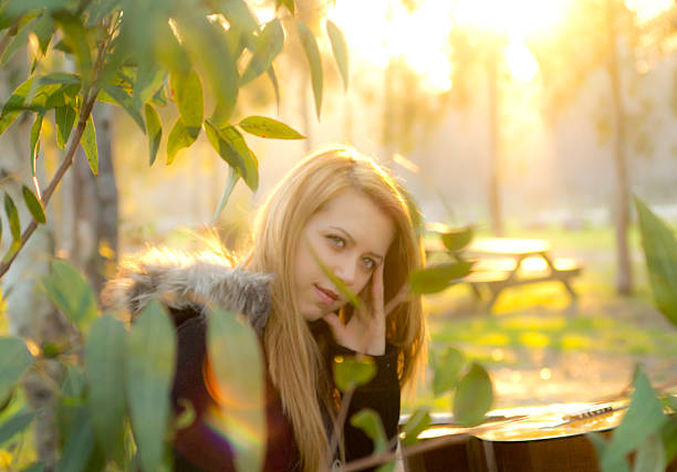 young women with guitar in outdoor
