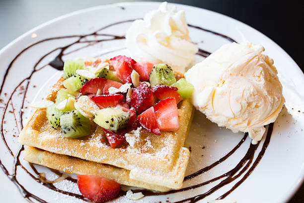 istock Waffles with fresh berries, whipped cream and ice cream 480500244