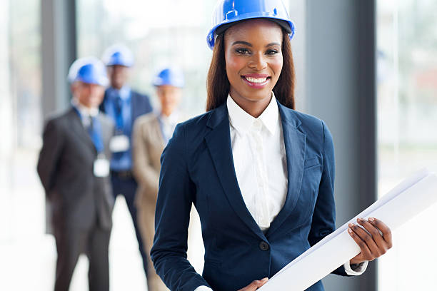 istock african american architect holding blue print 480501627