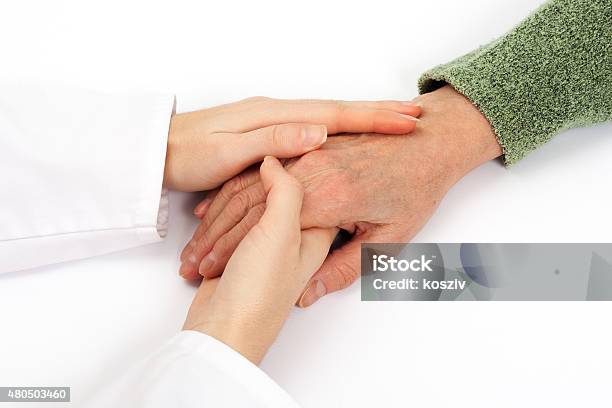 Holding Senior Hand Care Stock Photo - Download Image Now - 2015, 80-89 Years, Adult