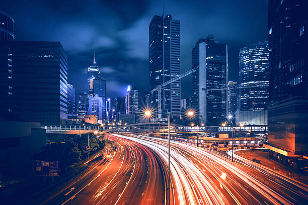 distrito central de hong kong en la noche - hong fotografías e imágenes de stock