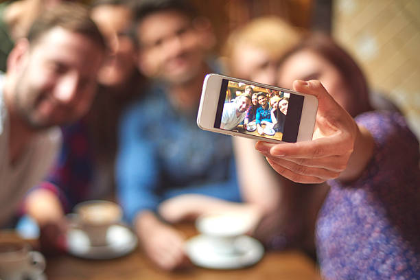 istock Group of friends taking selfie in the cafe 480511486
