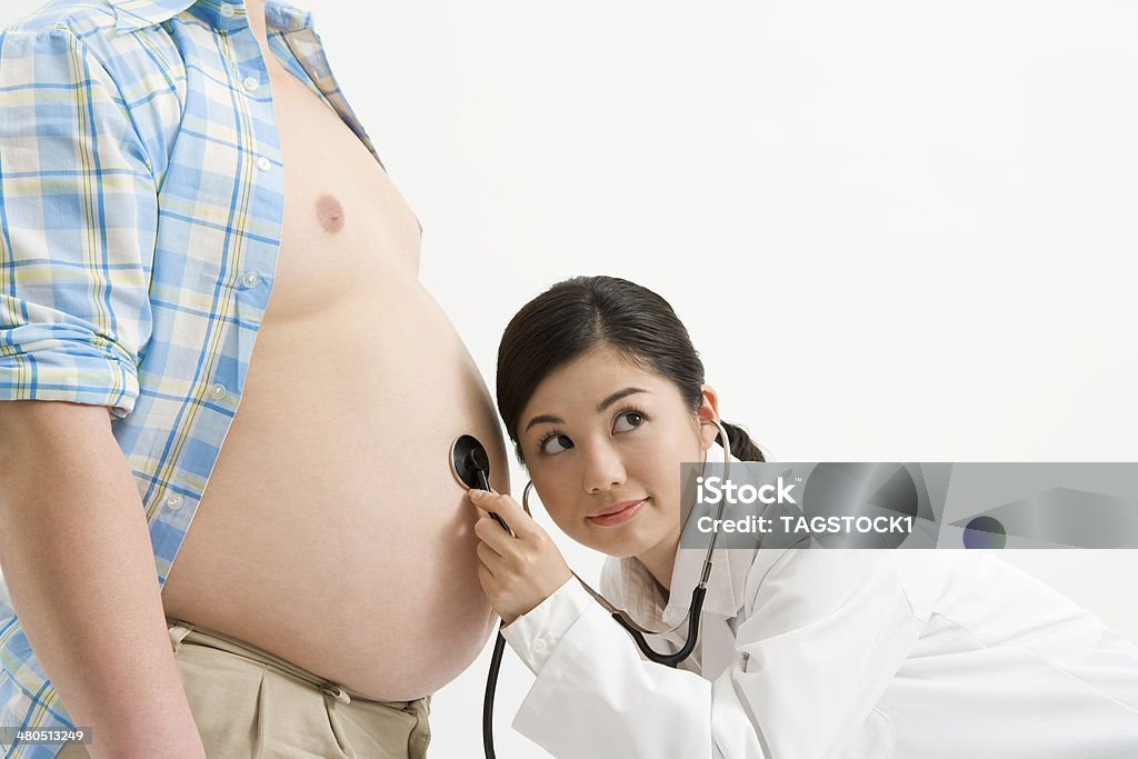 Obese man and doctor Overweight Stock Photo