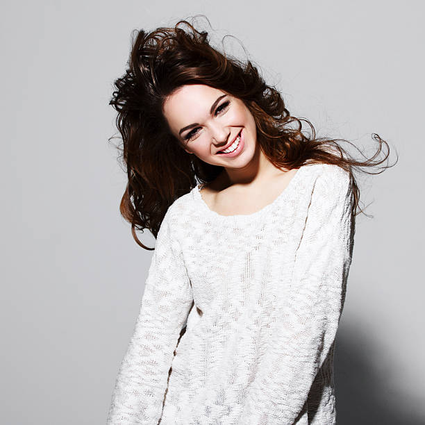 Portrait of smiling woman with beauty long brown hair stock photo