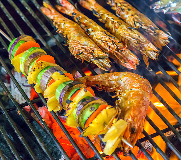 istock Grilled shrimps Barbecue Grill cooking seafood. 480518540