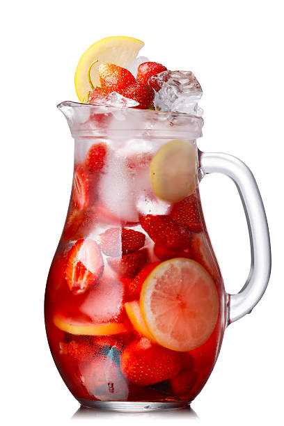 Strawberry lemon detox iced water in a glass jug. Healthy, clean eating