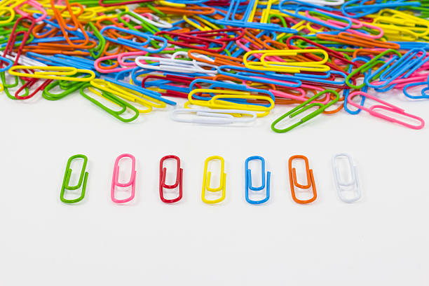 istock Colorful paperclips on white background isolated 480523106