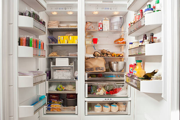 istock Open Refrigerator With Stocked Food Products 480528139