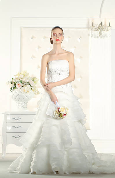 istock Gorgeous bride in a white room, posing 480531194