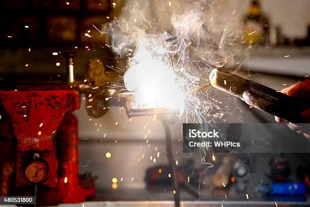 Worker In Action With No Protection Gloves Stock Photo - Download Image Now - 2015, Accuracy, Adult