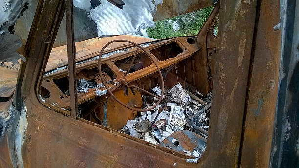 istock inside of a burnt-out van 480531872