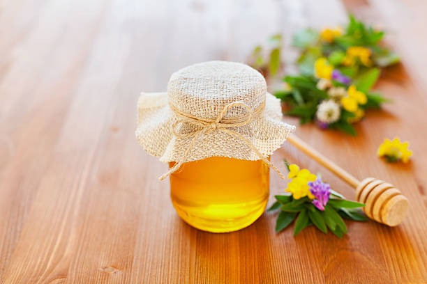 istock Natural honey with flowers 480531938