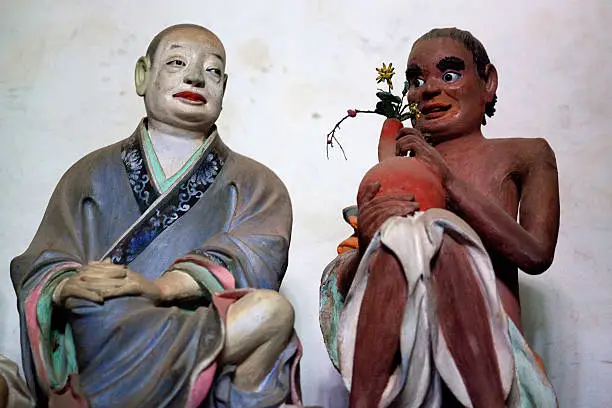 Statues of Buddhist Arhats by Li Guangxiu, a famous folk clay sculpture master in the Qing Dynasty at Qiongzhu Si (Bamboo temple) in Kunming, China.