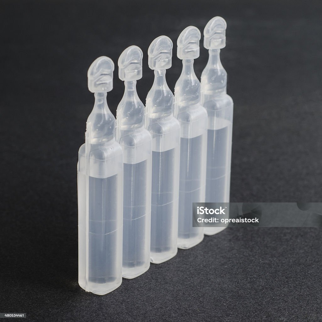 Vials containing physiological serum Asthma Inhaler Stock Photo