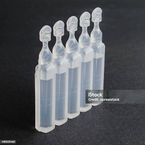 Vials Containing Physiological Serum Stock Photo - Download Image Now - Asthma Inhaler, Black Background, Canister
